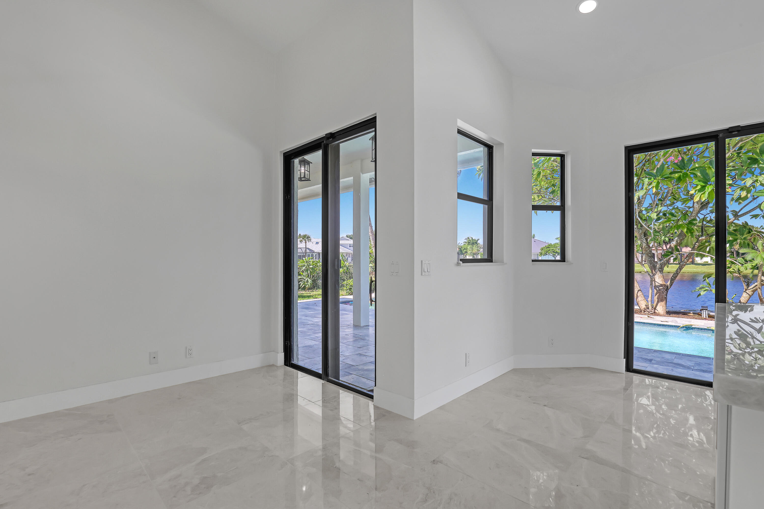 161 Apollo Circle Jupiter, FL 33477 - Photo 20 of 60 an empty room with windows