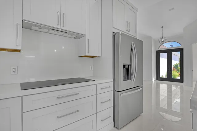 a view of a livingroom with furniture and windows
