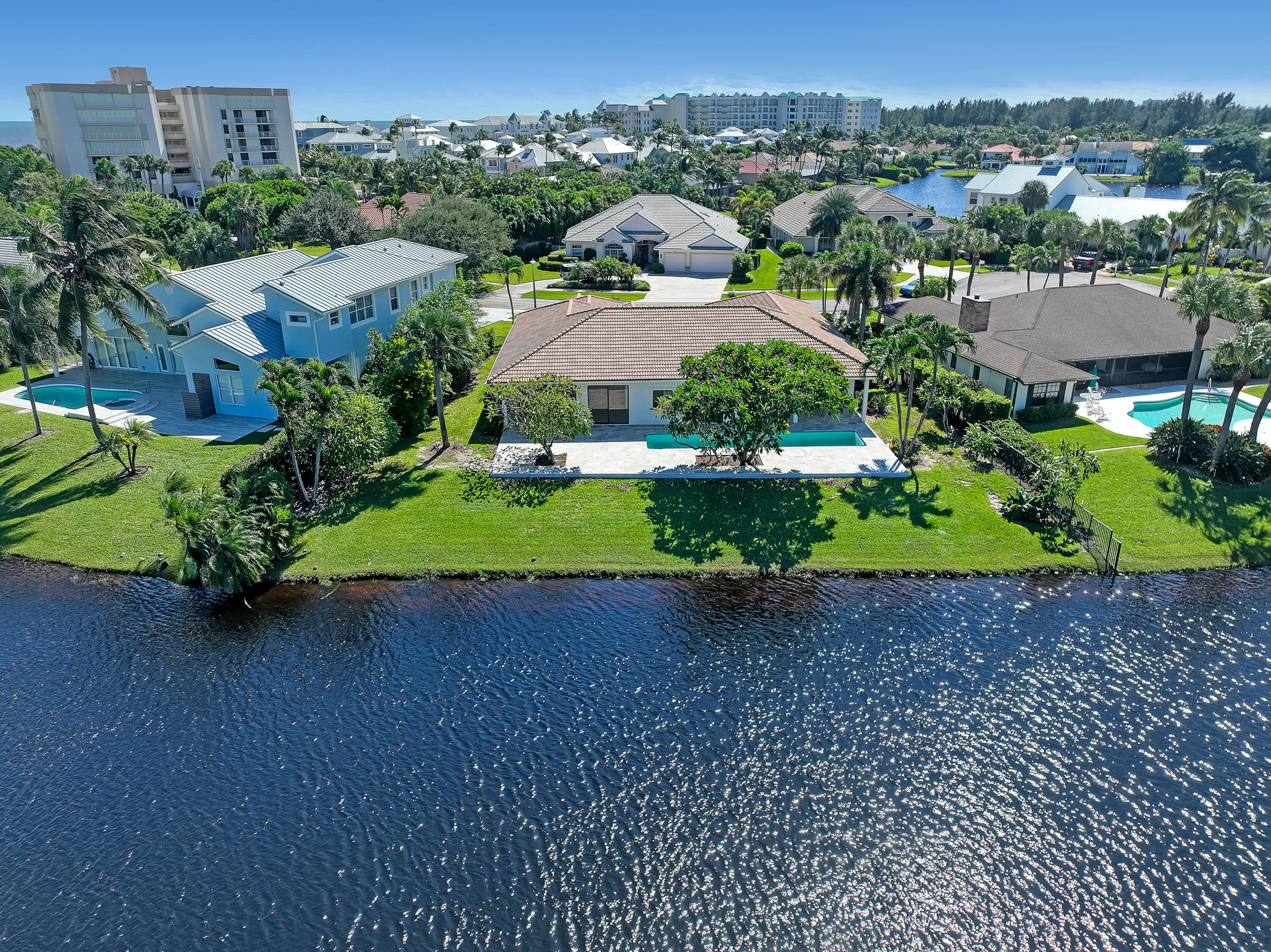 161 Apollo Circle Jupiter, FL 33477 - Photo 3 of 60 an aerial view of residential houses with outdoor space and street view