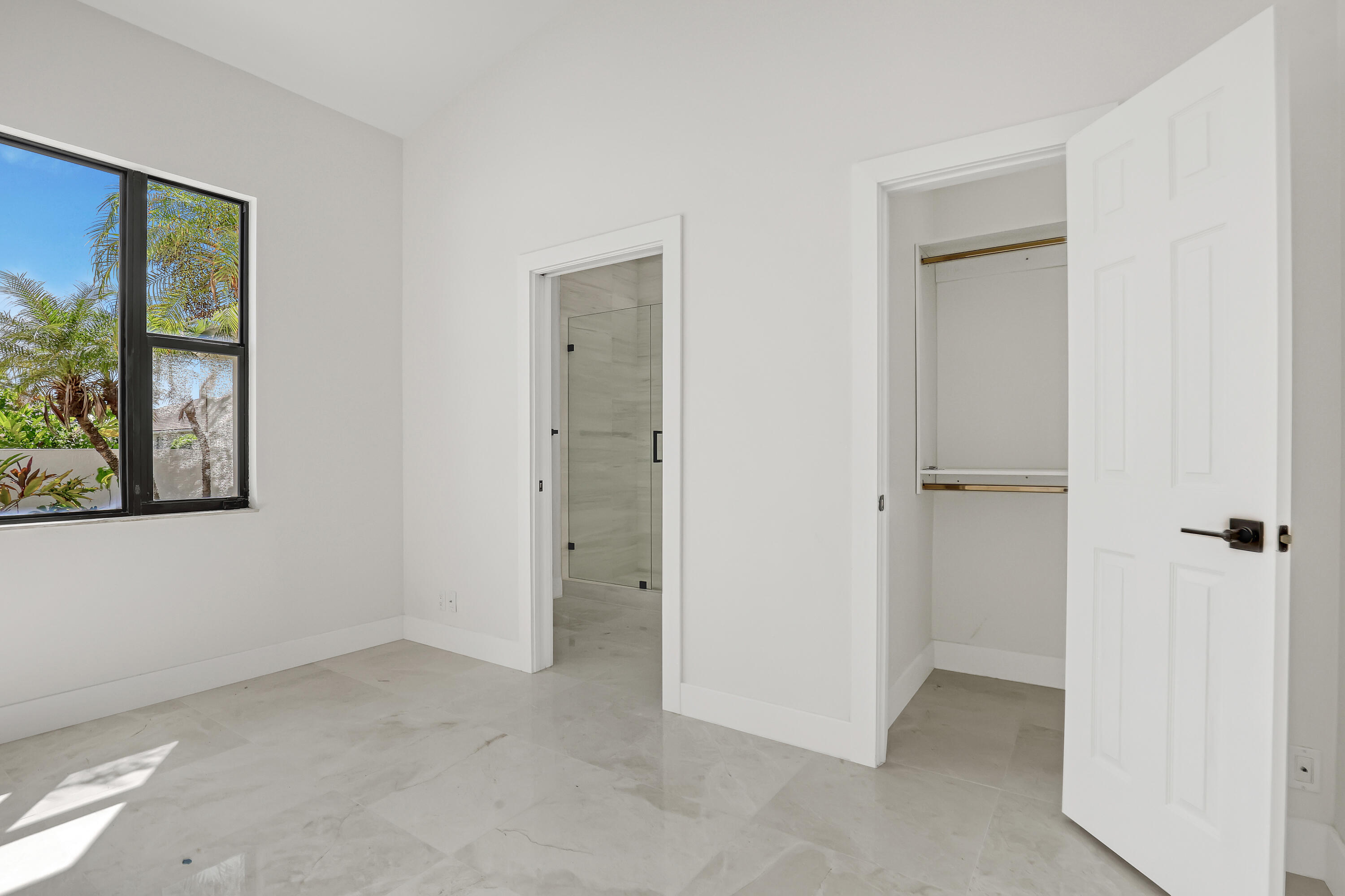 161 Apollo Circle Jupiter, FL 33477 - Photo 39 of 60 an empty room with windows and closet