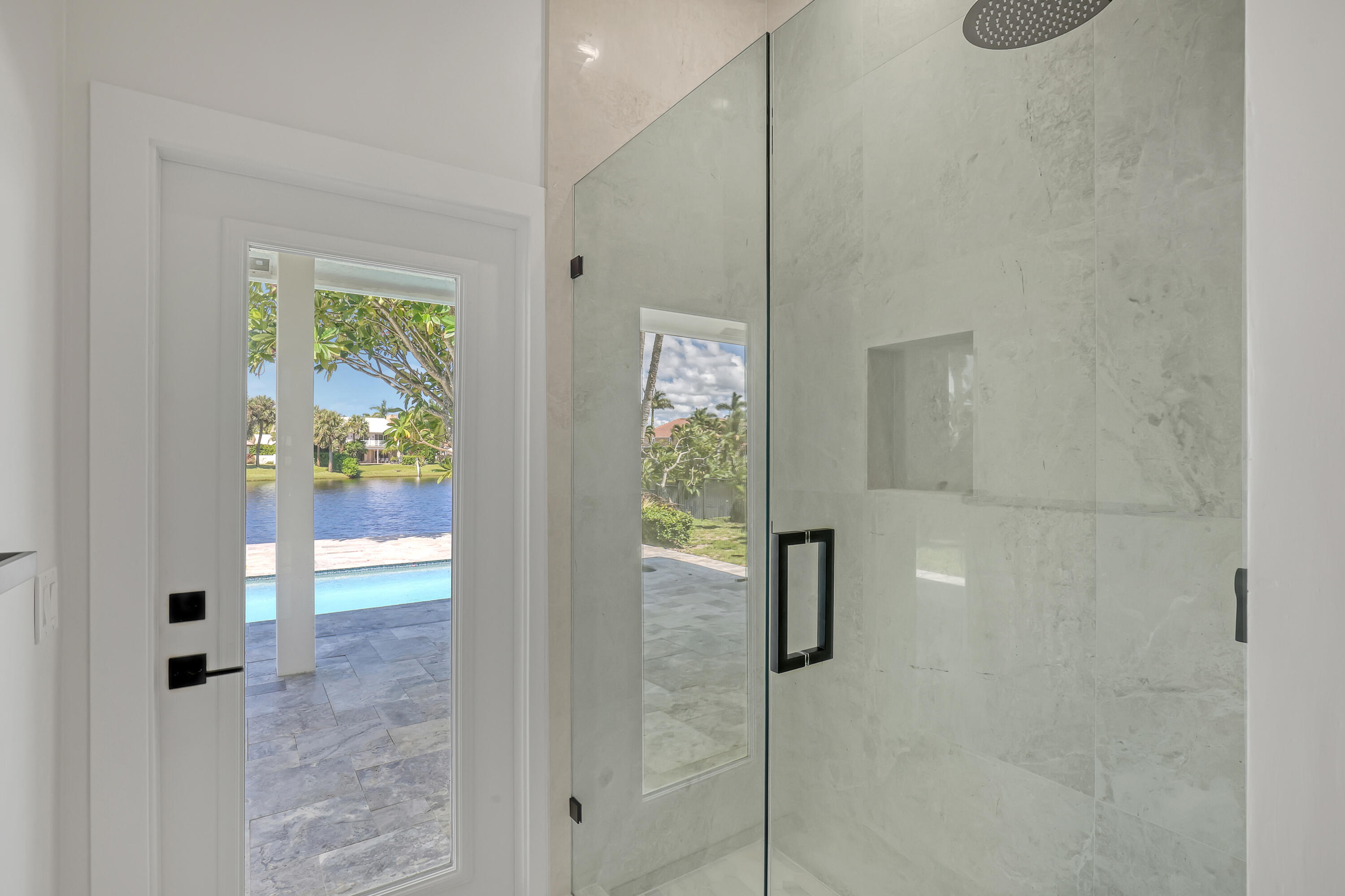 161 Apollo Circle Jupiter, FL 33477 - Photo 45 of 60 a bathroom with a shower
