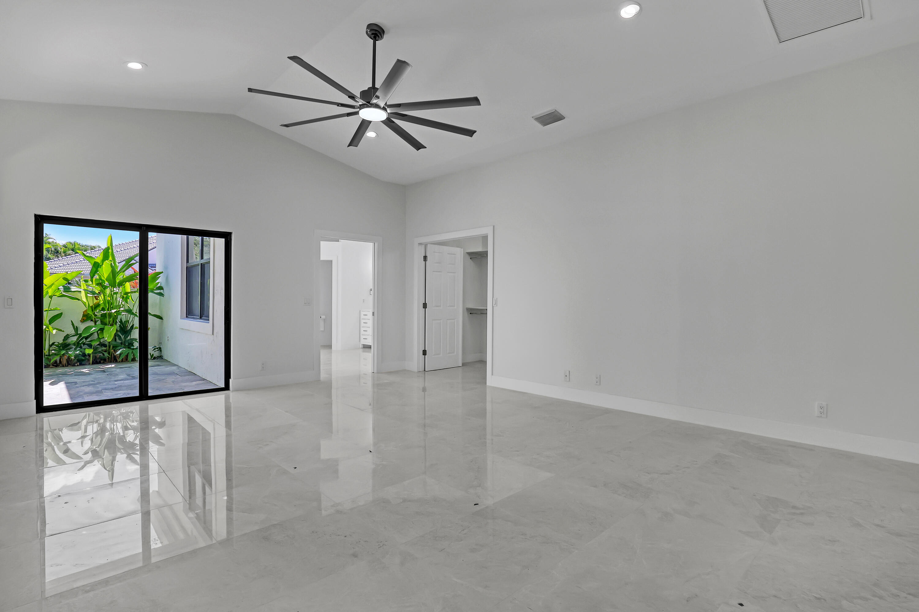 161 Apollo Circle Jupiter, FL 33477 - Photo 47 of 60 a view of an empty room with a window
