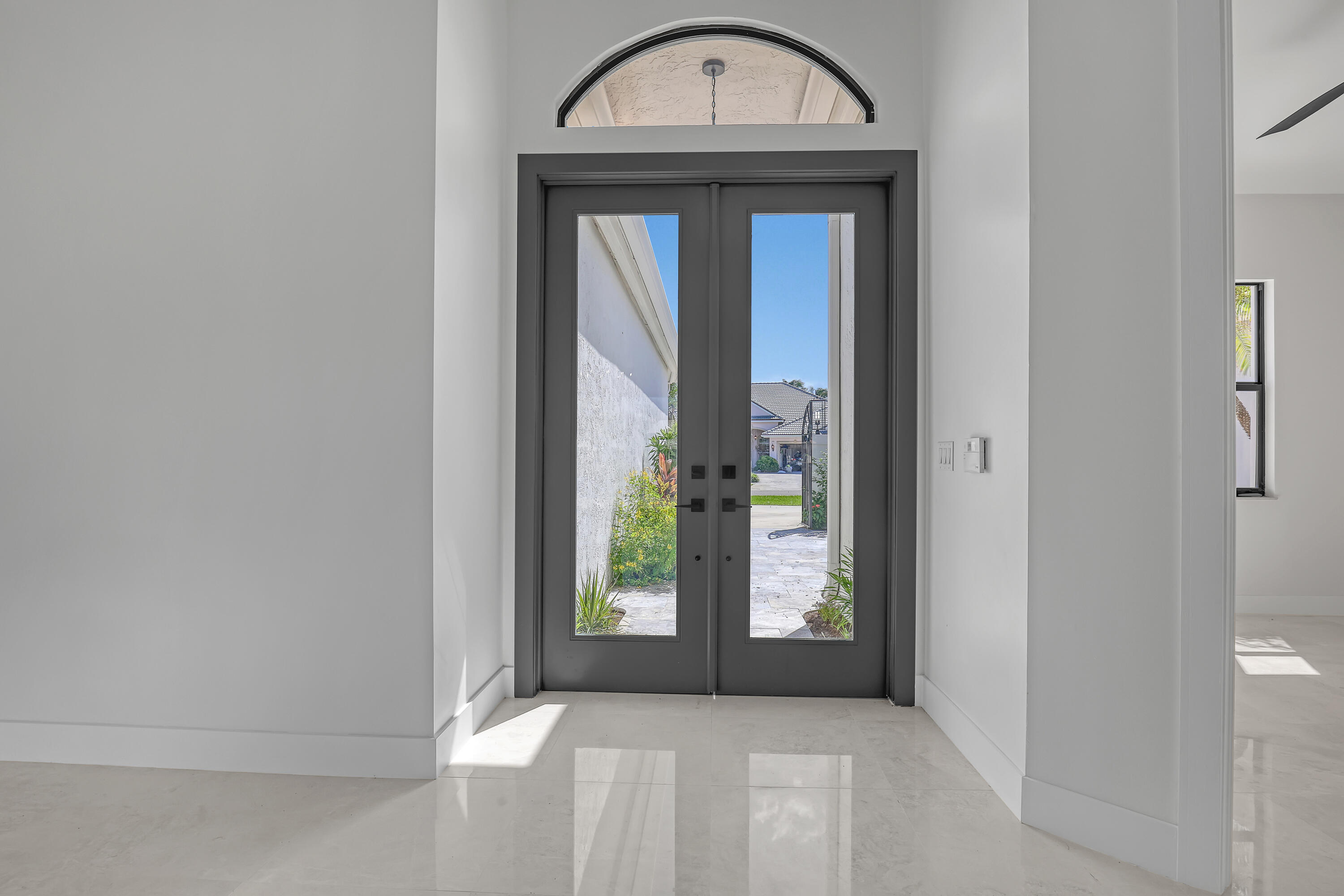 161 Apollo Circle Jupiter, FL 33477 - Photo 58 of 60 a view of a livingroom with a window