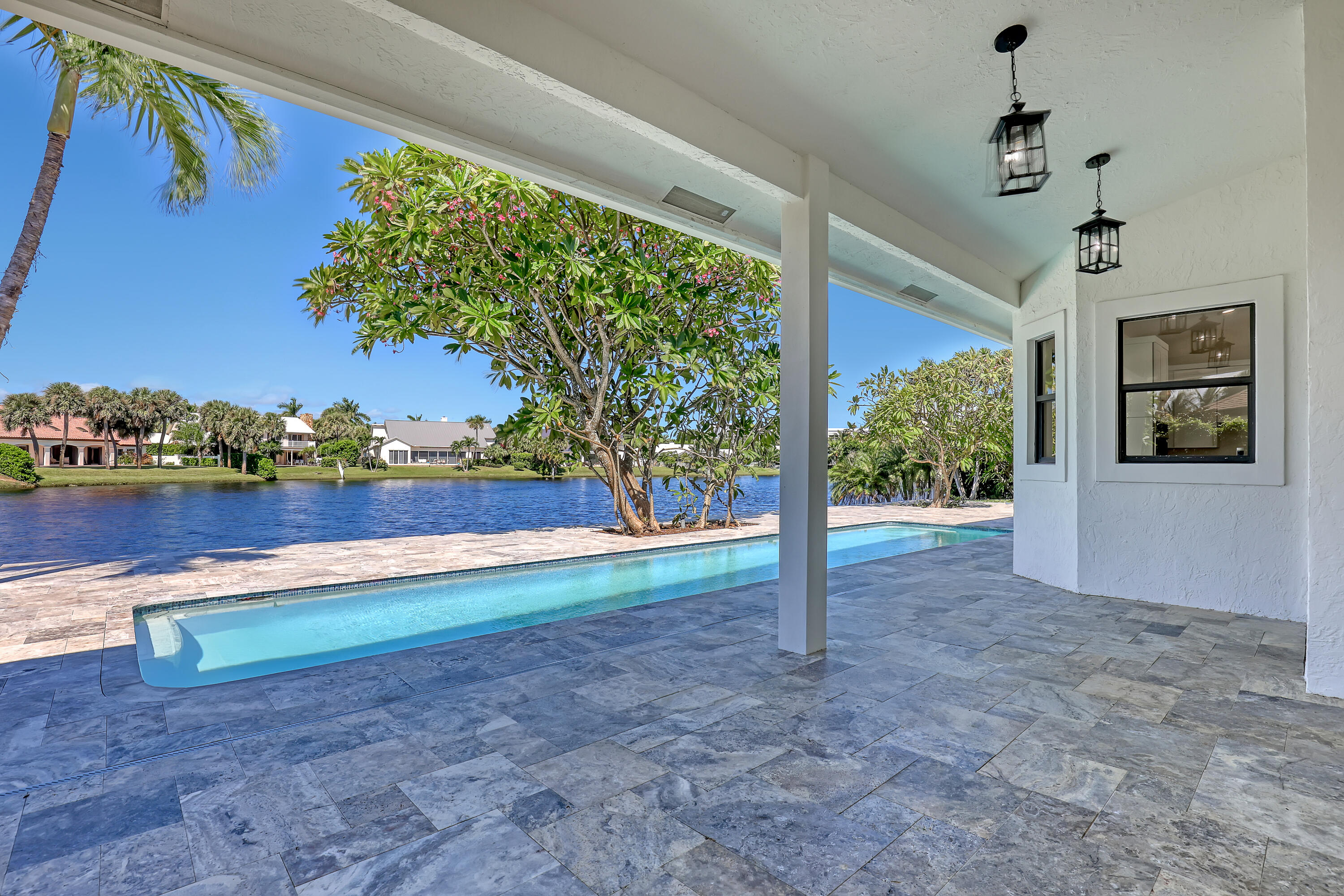 161 Apollo Circle Jupiter, FL 33477 - Photo 9 of 60 a view of a yard with an outdoor space