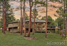 2420 Juniper Court Golden, CO 80401 - Photo 2 of 48 a view of a house with a yard