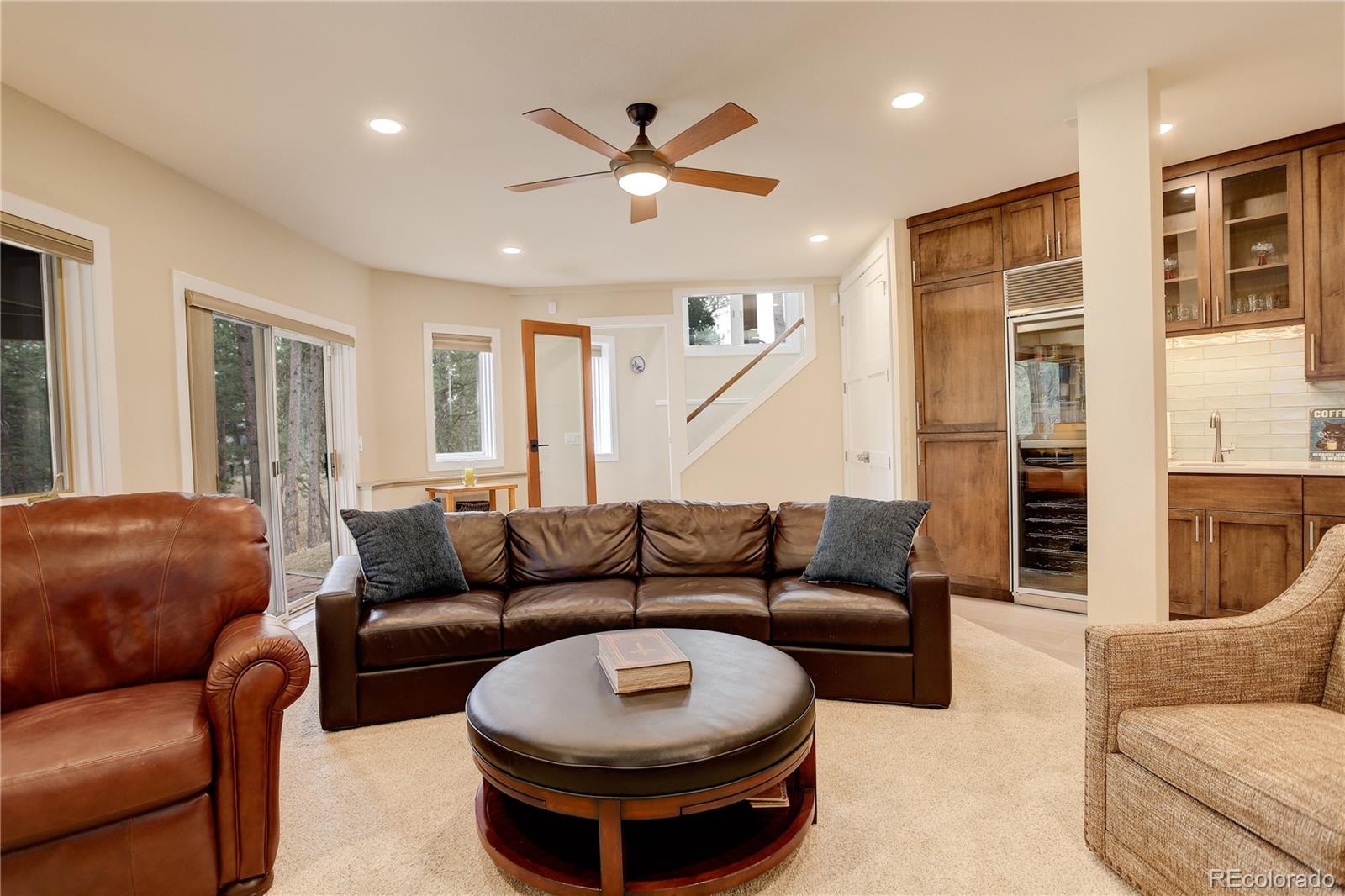 2420 Juniper Court Golden, CO 80401 - Photo 22 of 48 a living room with furniture and a large window