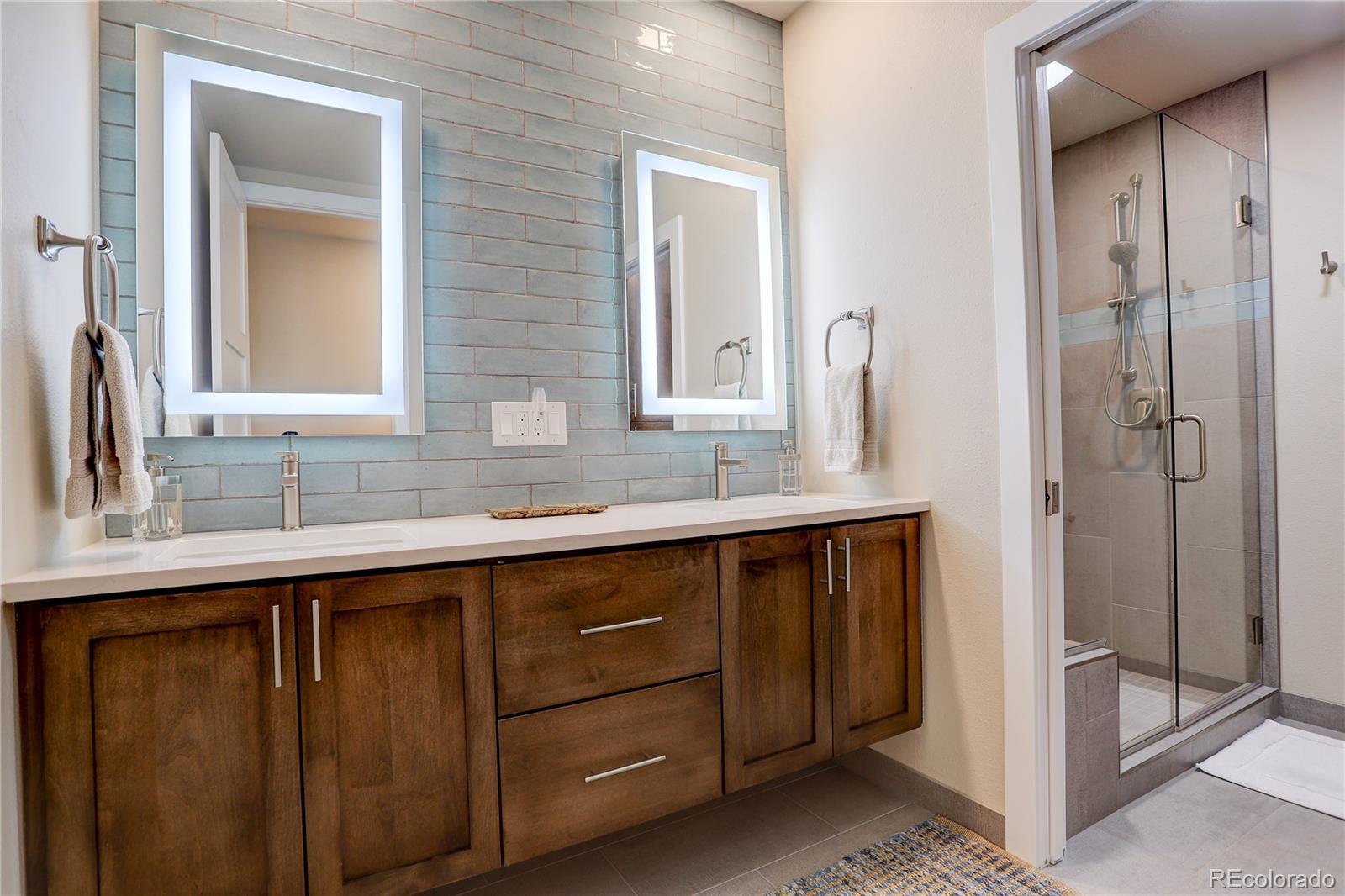 2420 Juniper Court Golden, CO 80401 - Photo 28 of 48 a bathroom with a sink and a mirror