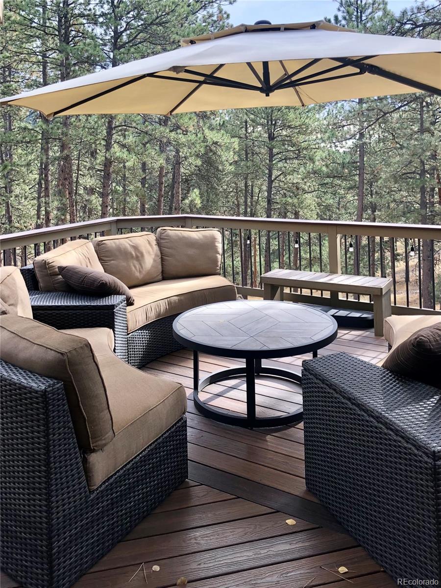 2420 Juniper Court Golden, CO 80401 - Photo 35 of 48 a balcony with furniture and a patio