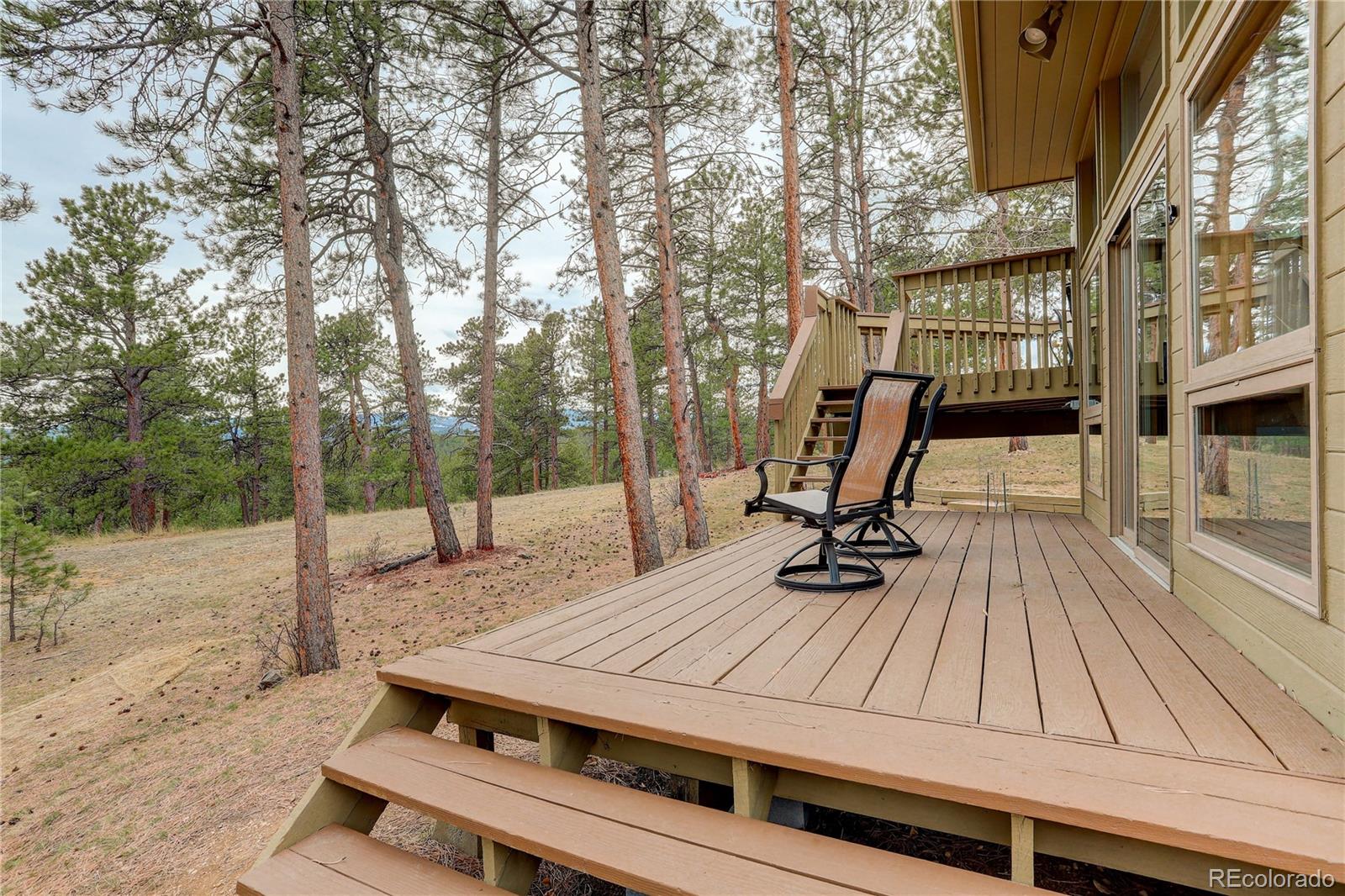 2420 Juniper Court Golden, CO 80401 - Photo 41 of 48 a view of backyard with sitting area