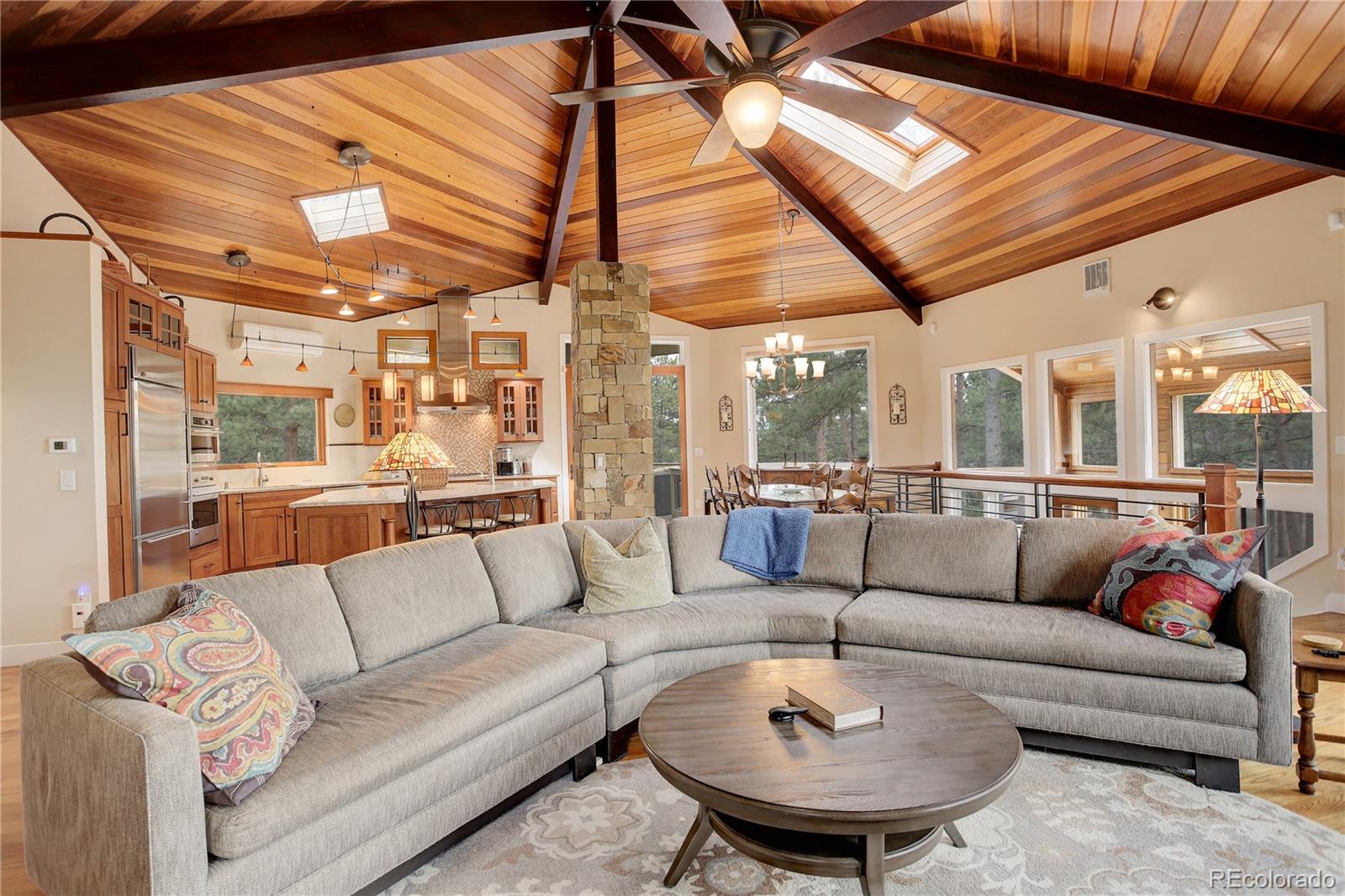 2420 Juniper Court Golden, CO 80401 - Photo 5 of 48 a living room with furniture and a ceiling fan