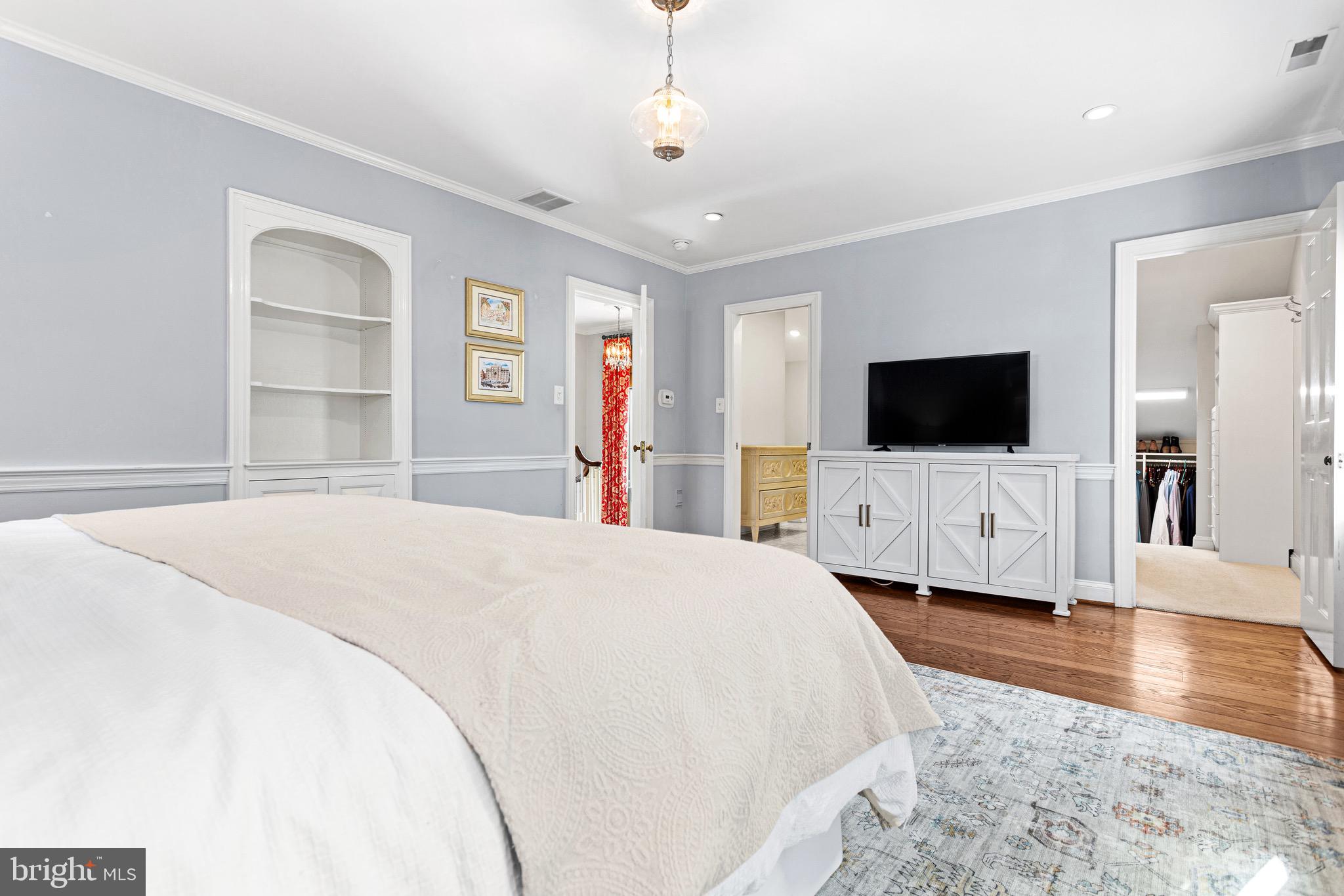 370 Station Avenue Haddonfield, NJ 08033 - Photo 24 of 48 a bedroom with a bed and a flat screen tv