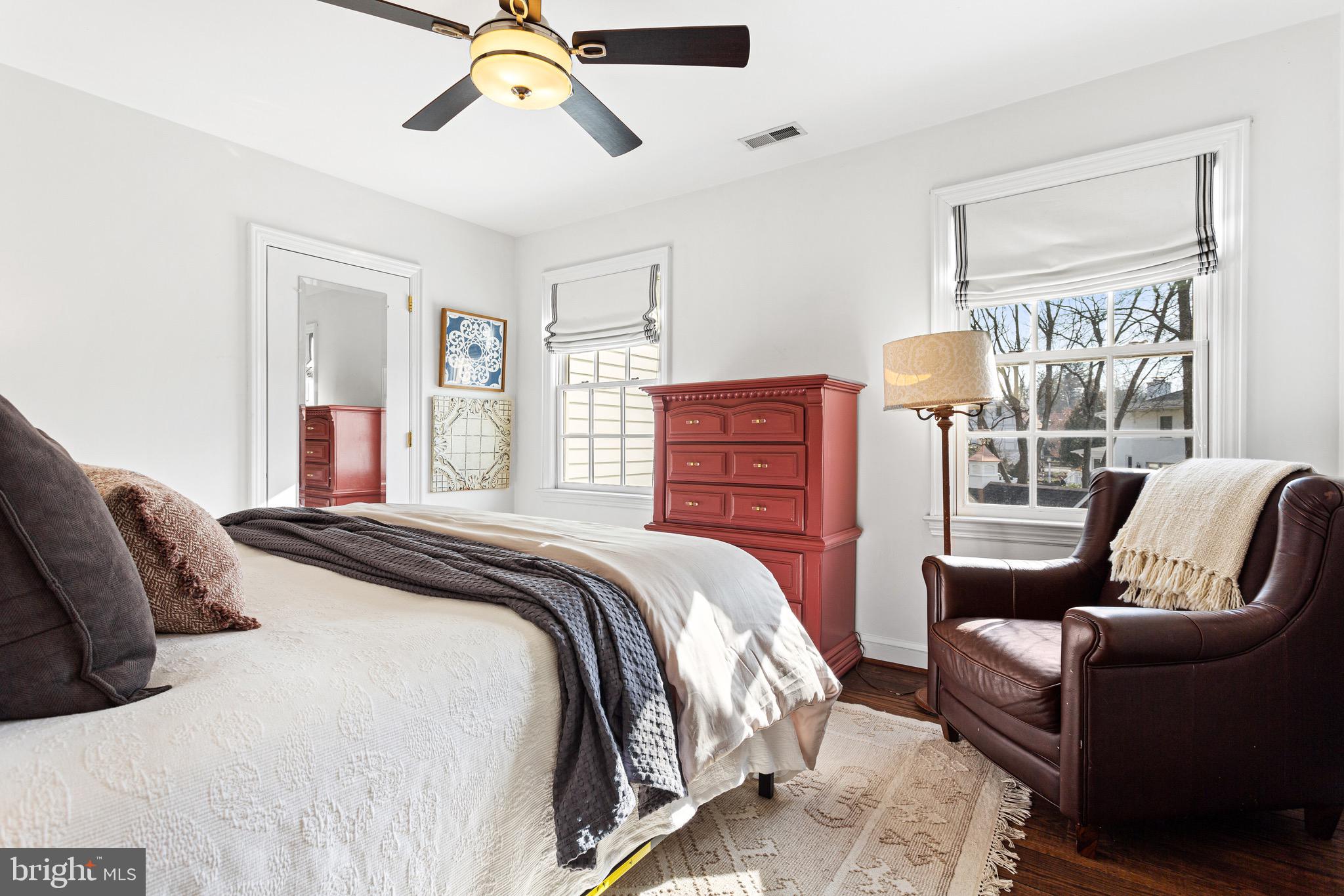 370 Station Avenue Haddonfield, NJ 08033 - Photo 30 of 48 a bedroom with a bed couch and window