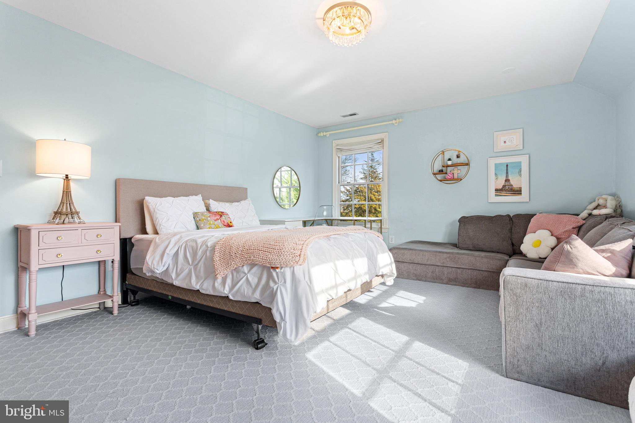 370 Station Avenue Haddonfield, NJ 08033 - Photo 38 of 48 a bedroom with a bed and a couch