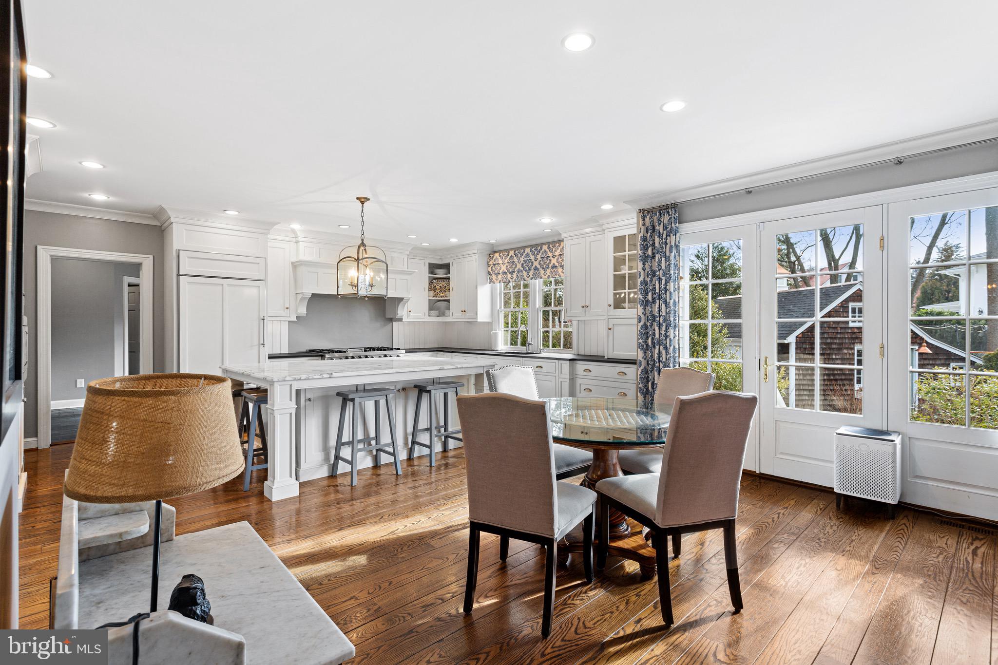 370 Station Avenue Haddonfield, NJ 08033 - Photo 8 of 48 a dining room with furniture and a floor to ceiling window