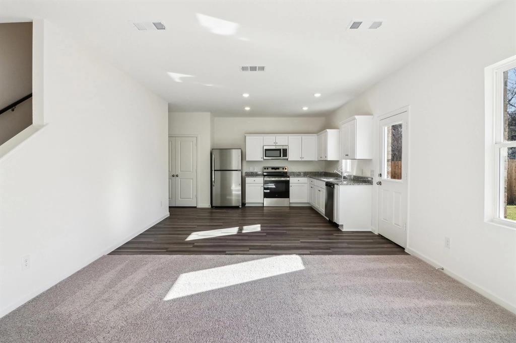 14126 Donahue Street Pilot Point, TX 76258 - Photo 11 of 21 a view of kitchen with wooden floor