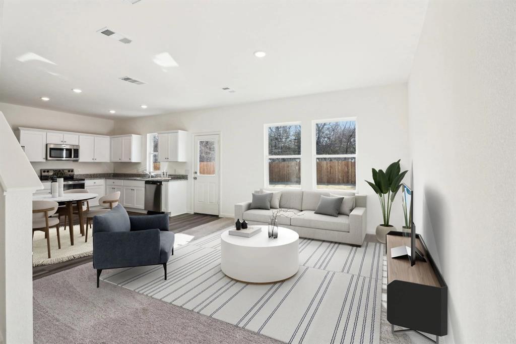 14126 Donahue Street Pilot Point, TX 76258 - Photo 7 of 21 a living room with furniture and a large window