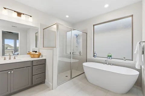a bathroom with a double vanity sink mirror and double
