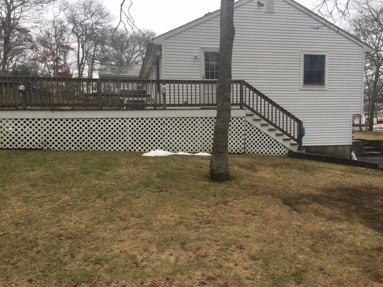 32 Foster Howard Road Pocasset, MA 02559 - Photo 12 of 13 a side view of a fence