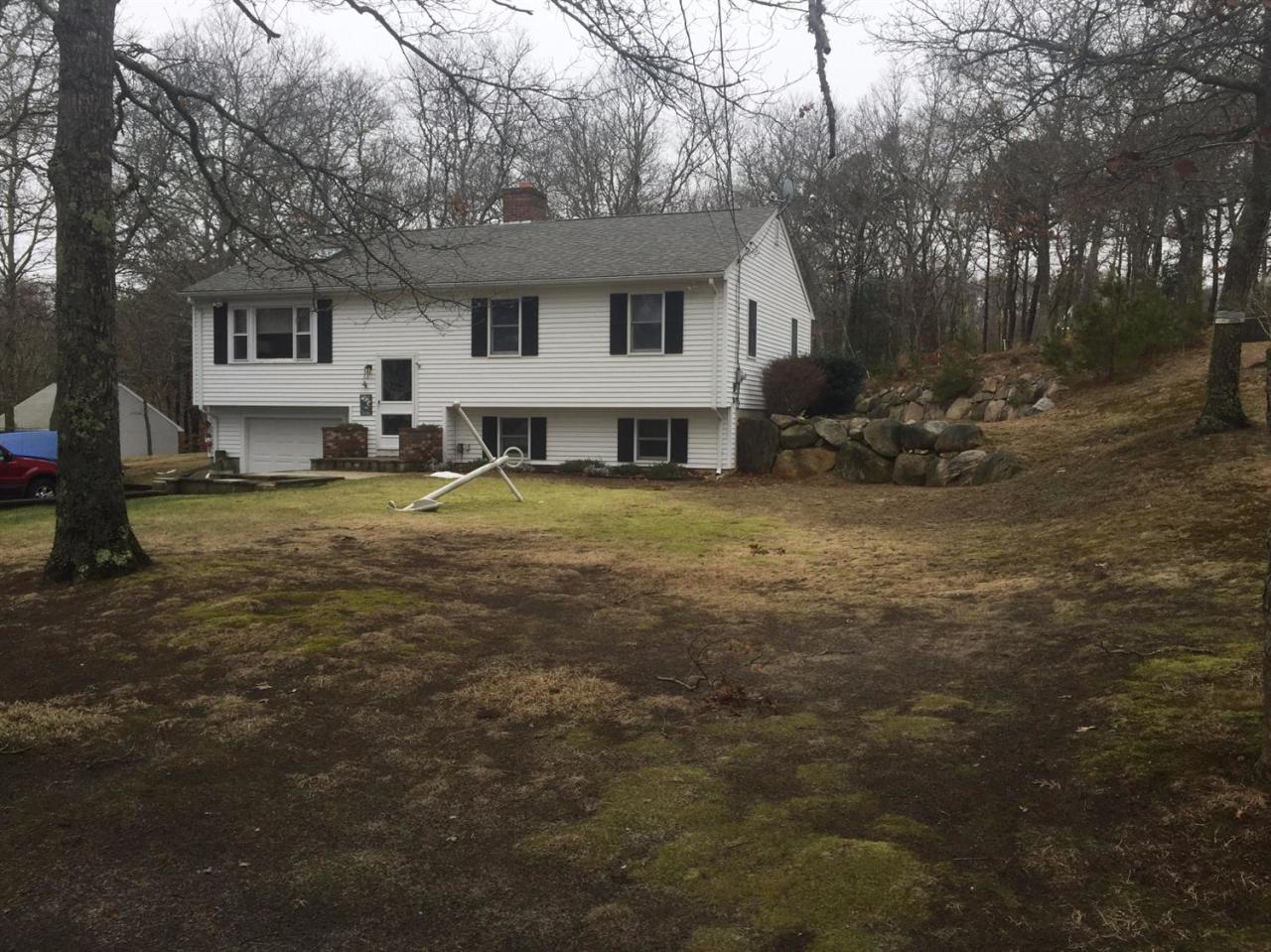 32 Foster Howard Road Pocasset, MA 02559 - Photo 13 of 13 a view of a house with a yard
