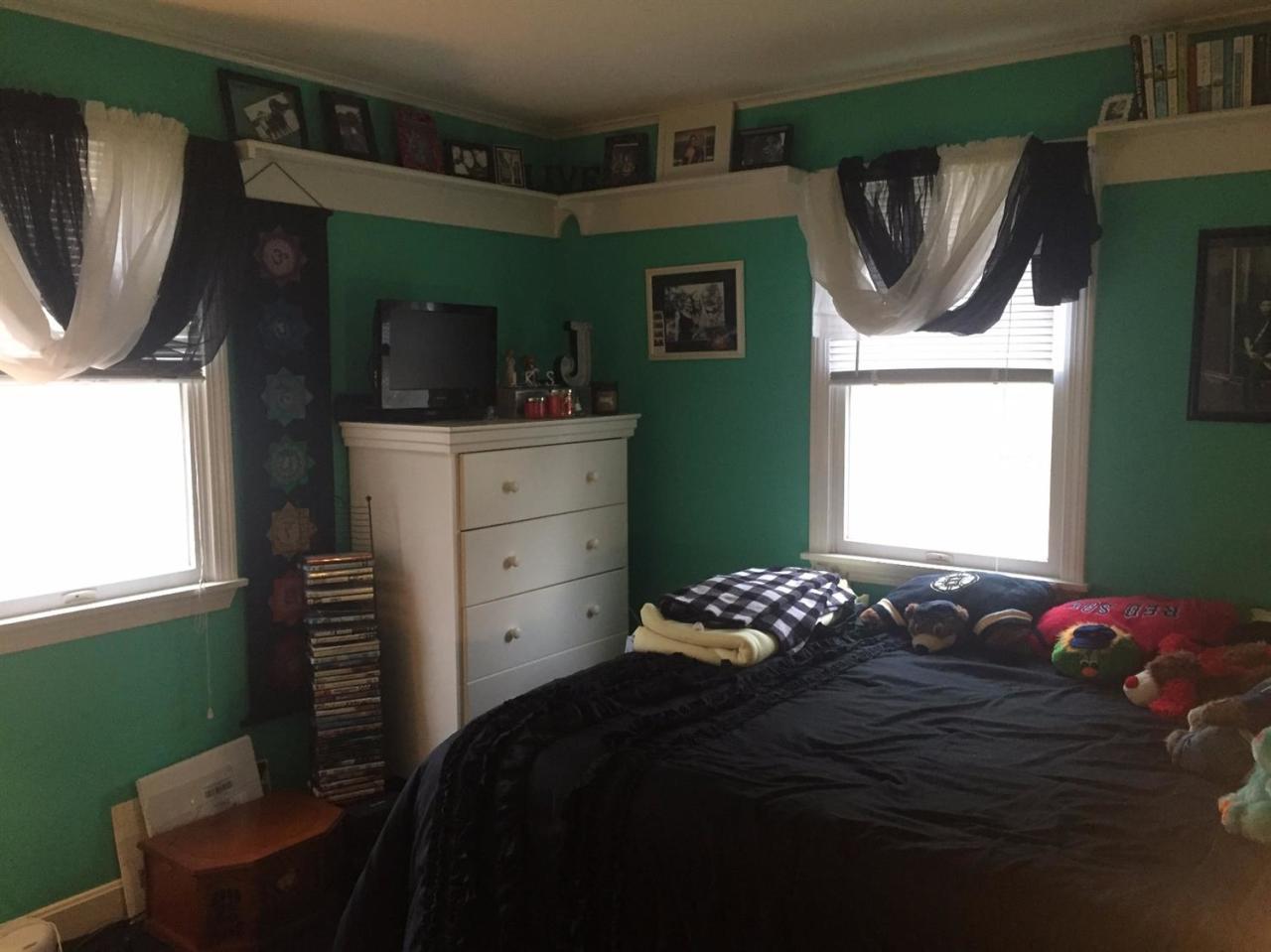 32 Foster Howard Road Pocasset, MA 02559 - Photo 8 of 13 a bedroom with a bed and a window