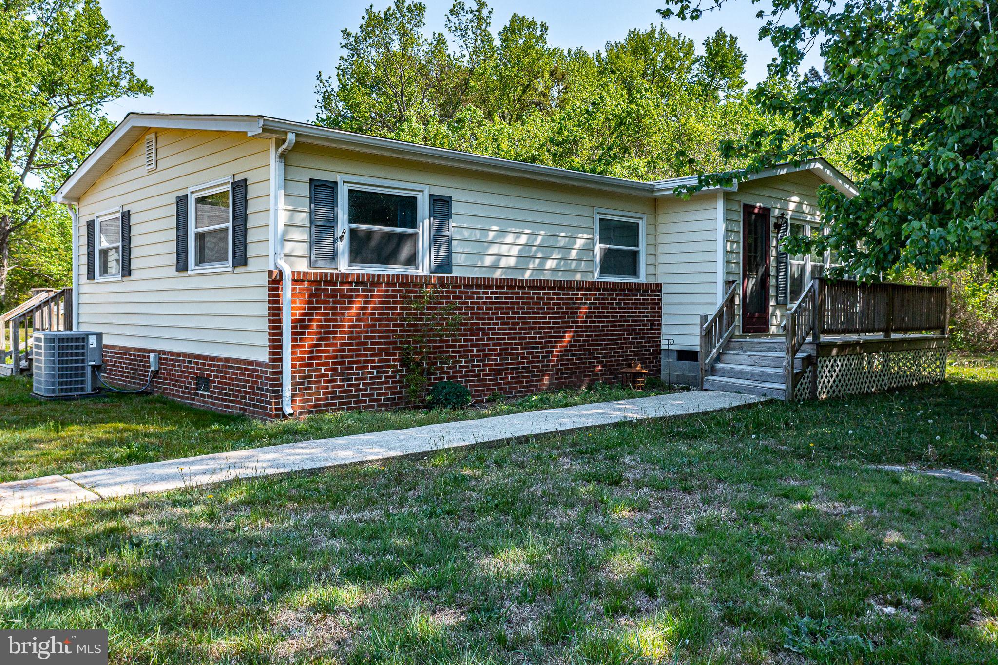 529 Taylors Beach Road Reedville, VA 22539 - Photo 1 of 57 Charming home with inviting entrance.