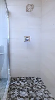 a kitchen with a stove sink and refrigerator