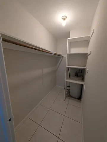 a utility room with washer and dryer