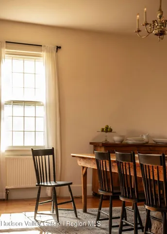 a view of a balcony with chairs