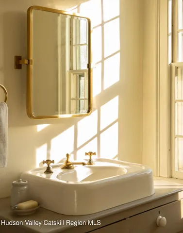 a view of bedroom with furniture and window