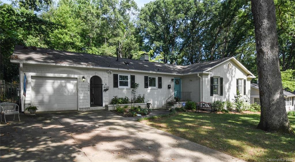 5644 Londonderry Road Charlotte, NC 28210 - Photo 2 of 23 a front view of a house with a yard