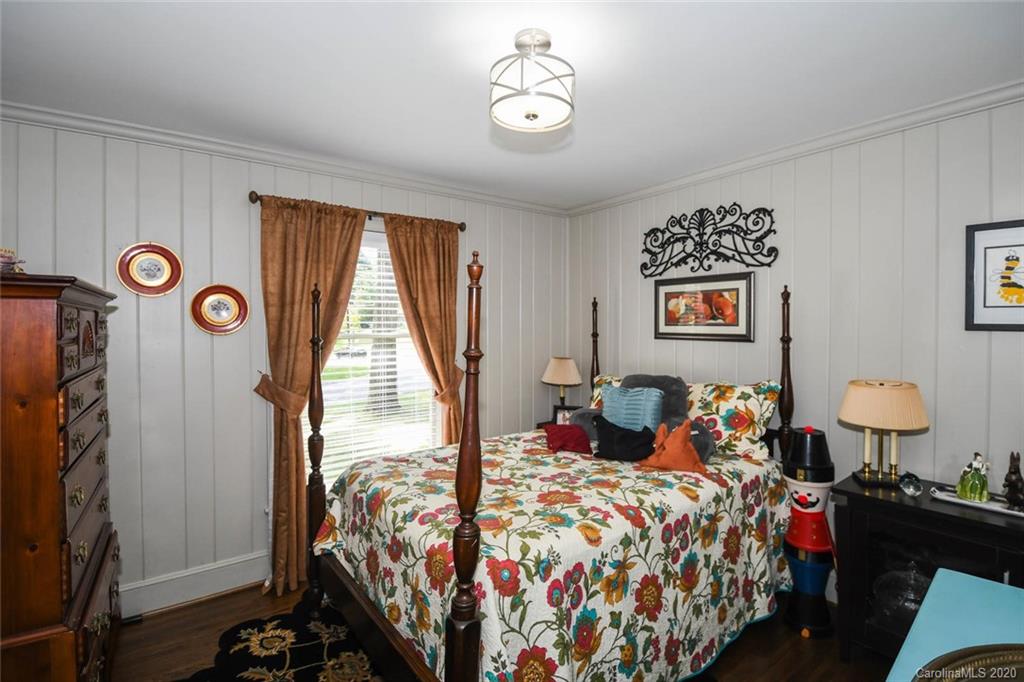 5644 Londonderry Road Charlotte, NC 28210 - Photo 17 of 23 a bedroom with bed and a window