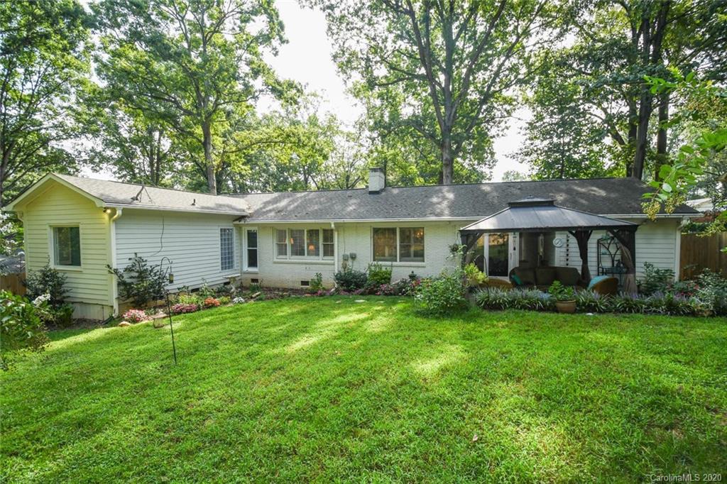 5644 Londonderry Road Charlotte, NC 28210 - Photo 20 of 23 a front view of a house with a garden