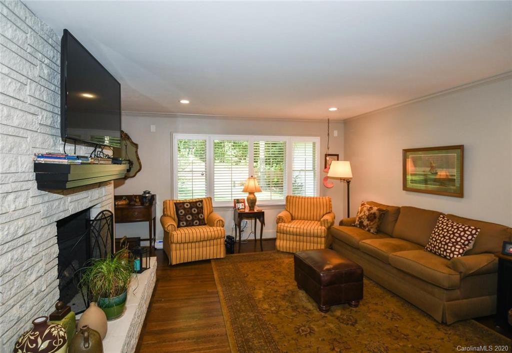 5644 Londonderry Road Charlotte, NC 28210 - Photo 4 of 23 a living room with furniture and a fireplace