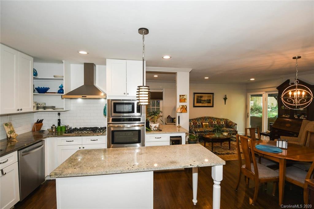 5644 Londonderry Road Charlotte, NC 28210 - Photo 10 of 23 a kitchen with sink refrigerator and stove