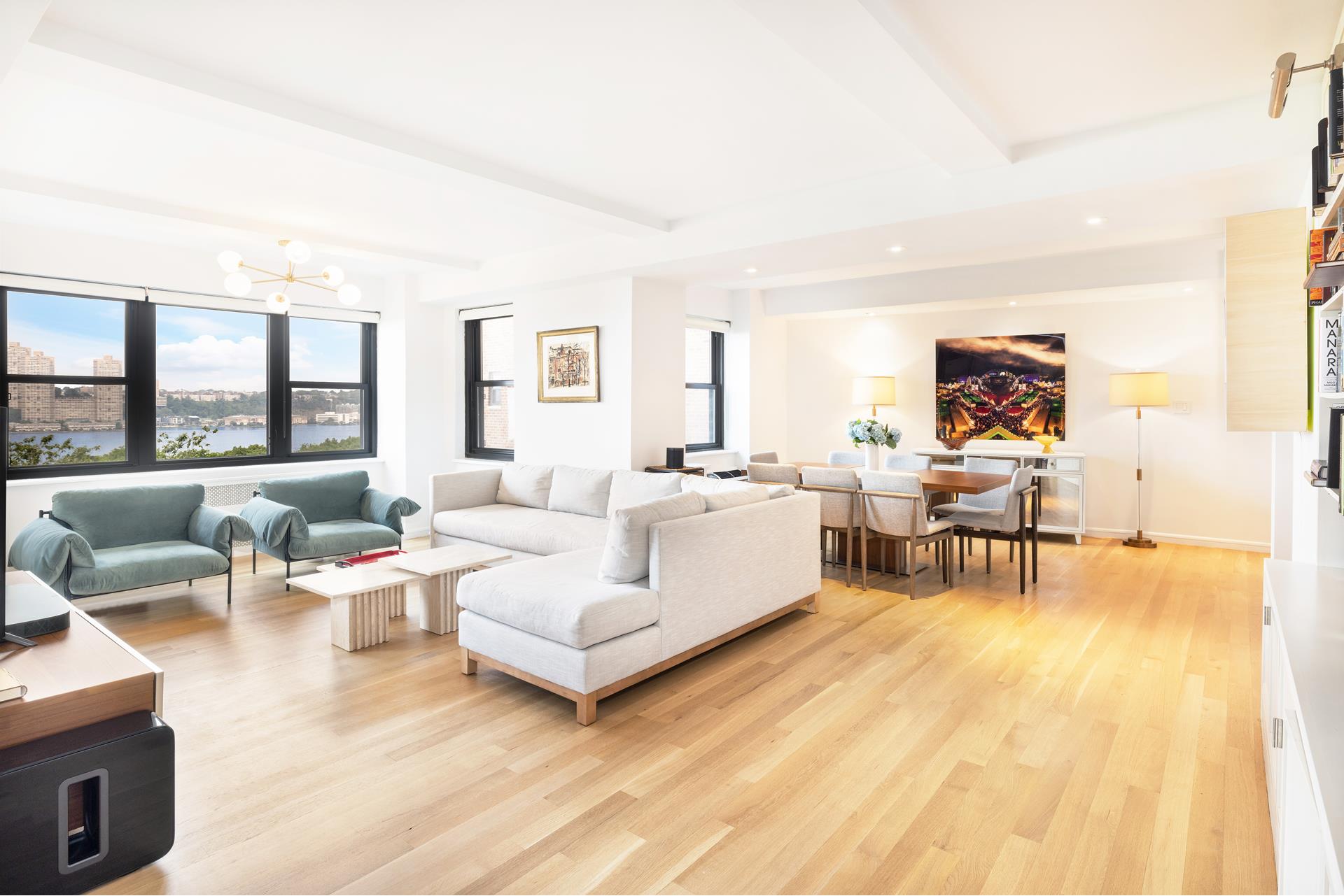 11 Riverside Drive, Unit 8JHW Manhattan, NY 10023 - Photo 3 of 15 a living room with furniture and a table