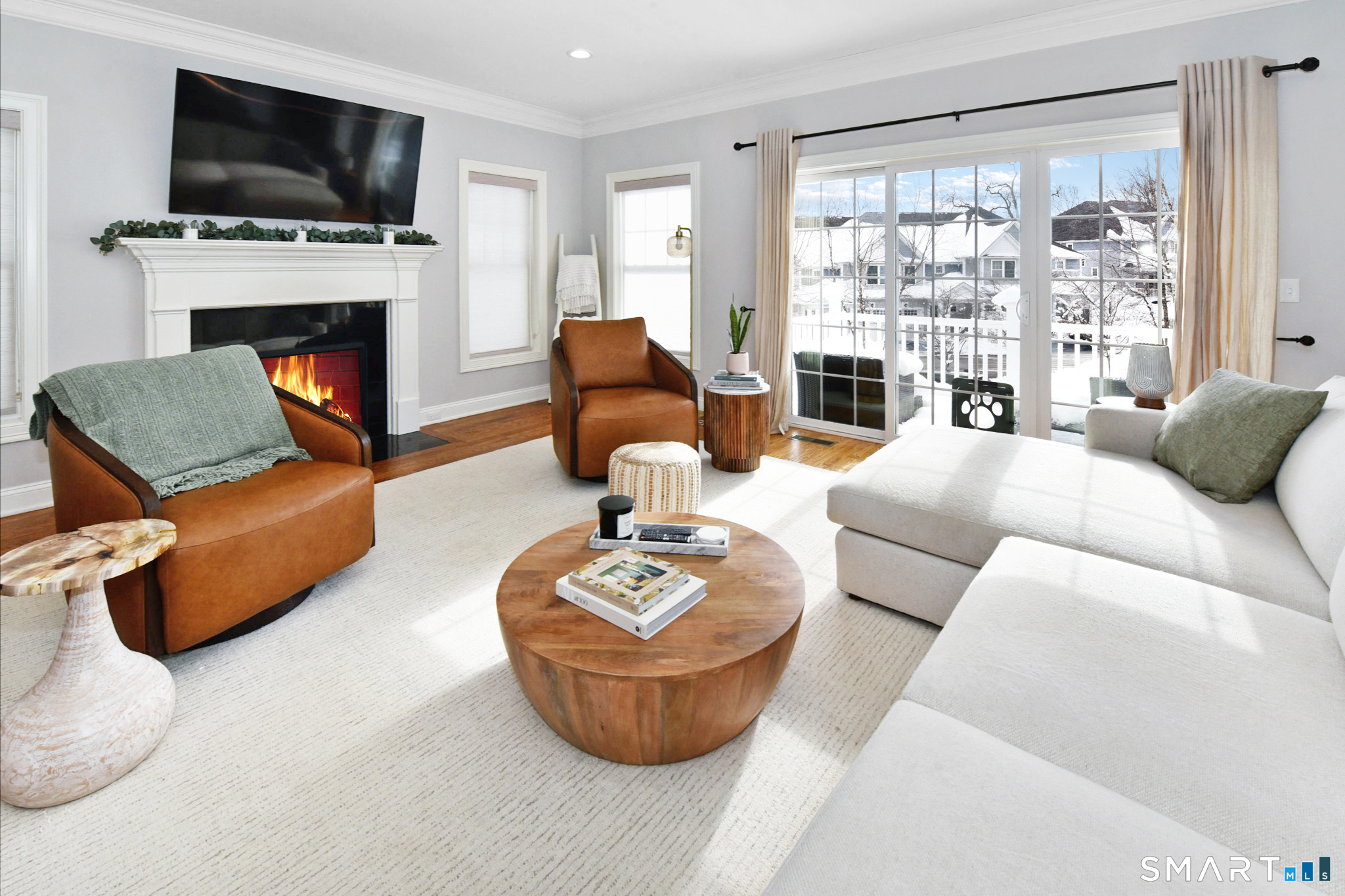 500 River Road, Unit 3 Shelton, CT 06484 - Photo 6 of 36 a living room with furniture a flat screen tv and a fireplace