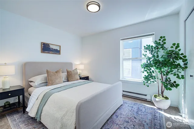 a bathroom with a sink vanity and a mirror