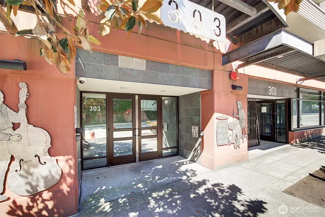 a view of an empty room with stairs