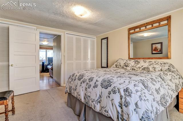 1824 Ridgeway Avenue Colorado Springs, CO 80906 - Photo 17 of 19 Master bedroom towards living room