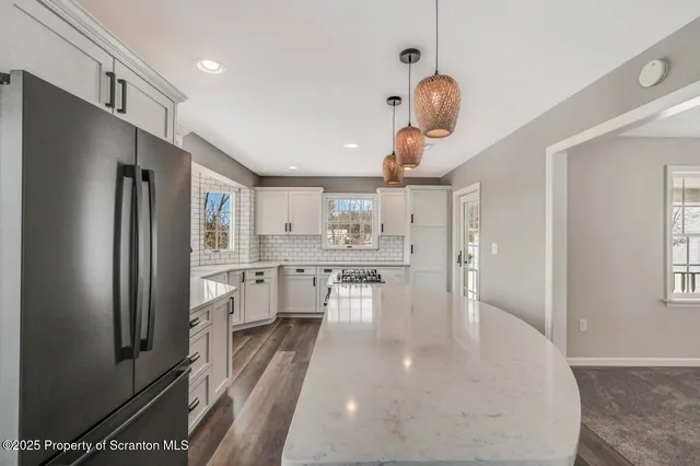 a view of livingroom with furniture and chandelier