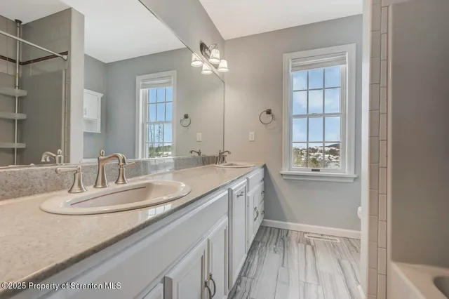 a bathroom with a shower and a toilet