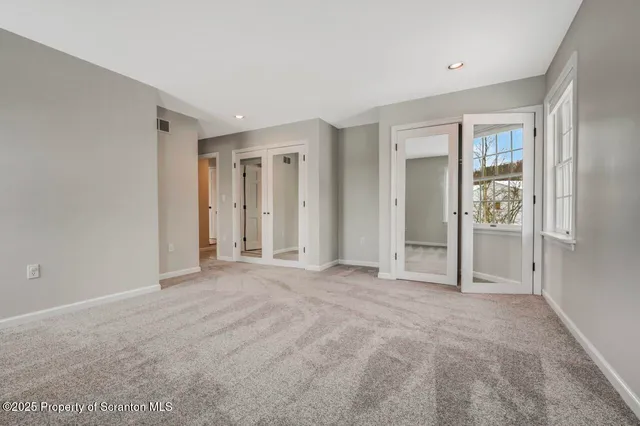 a view of a building with a snow