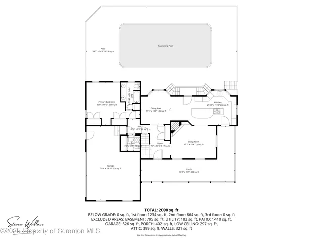 a kitchen with stainless steel appliances kitchen island granite countertop a sink a stove and a window
