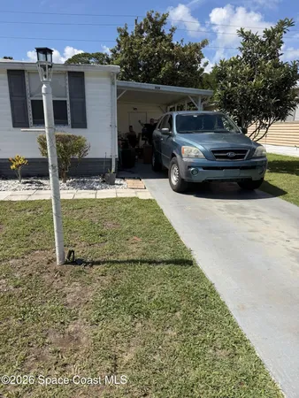 $84,900 | 909 Vireo Drive, Barefoot Bay, FL 32976