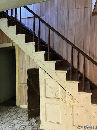 a view of a livingroom with furniture and a fireplace