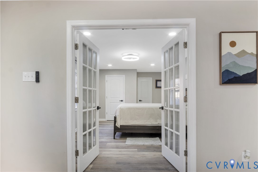 113 Red Dirt Road Williamsburg, VA 23188 - Photo 17 of 41 a view of a bedroom from a hallway