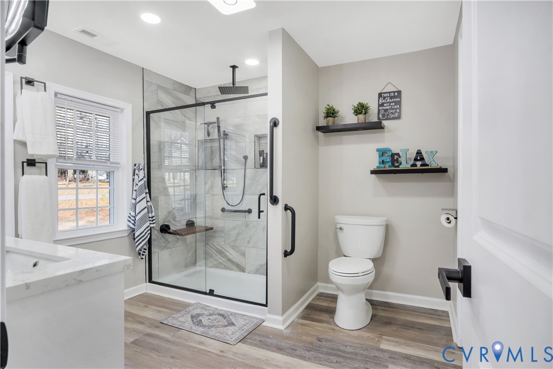 113 Red Dirt Road Williamsburg, VA 23188 - Photo 19 of 41 a bathroom with a toilet and a shower