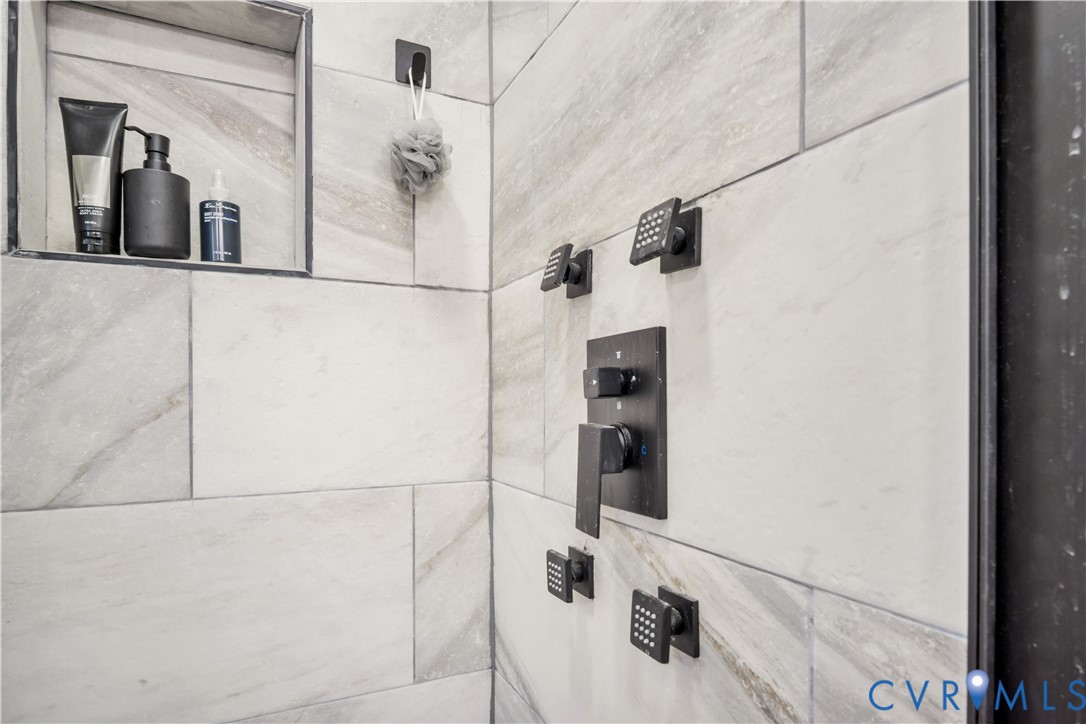 113 Red Dirt Road Williamsburg, VA 23188 - Photo 22 of 41 a bathroom with a shower and mirror