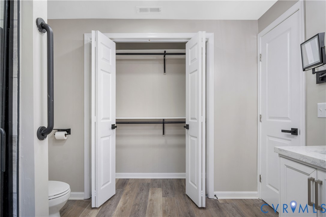 113 Red Dirt Road Williamsburg, VA 23188 - Photo 25 of 41 a bathroom with a shower and a toilet