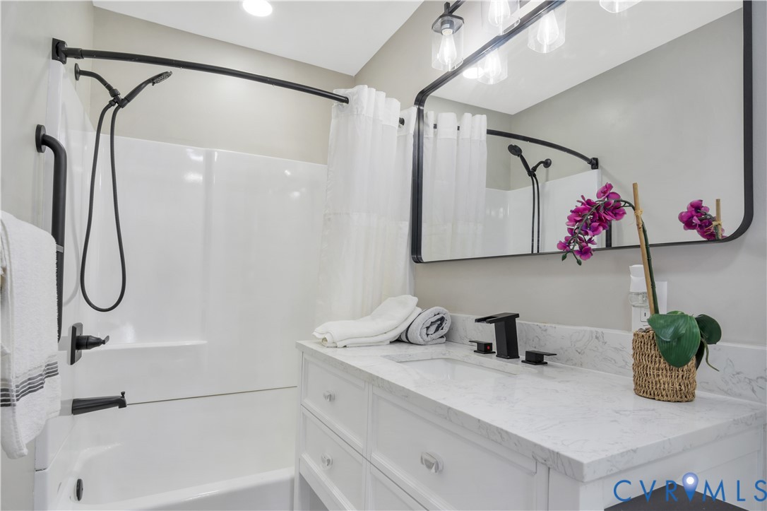 113 Red Dirt Road Williamsburg, VA 23188 - Photo 35 of 41 a bathroom with a bathtub and a shower
